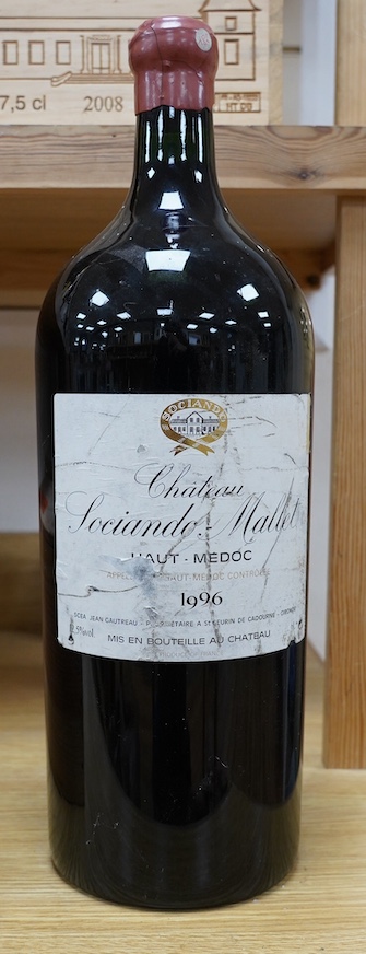 An Imperial (6lt.) bottle of Chateau Sociando Mallet 1996. Condition - fair to good, some cracks and losses to wax seal and damage to label